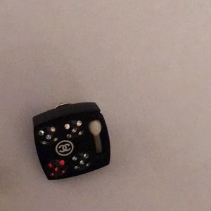 Chanel pins perfume bottle and makeup pallet